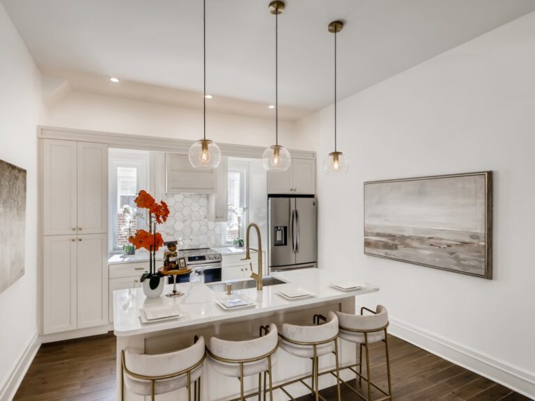 Modern McDonough GA Kitchen Renovation Design with marble countertops, creamy off white skinny shaker cabinets and brass gold fixtures | THE SAVVY ID Interior Design